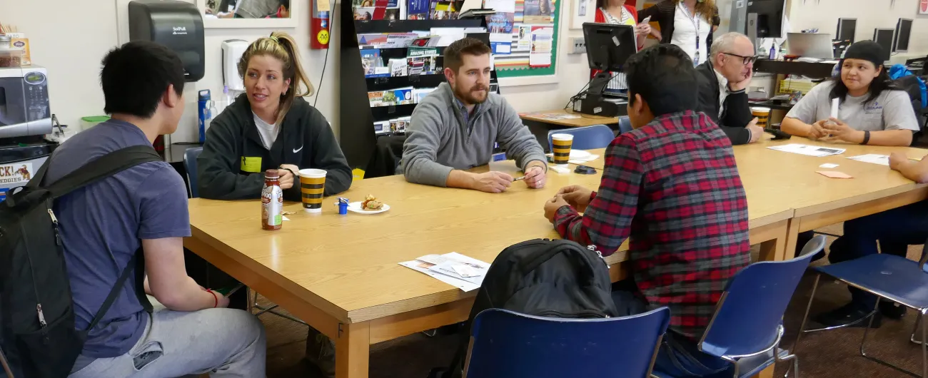 Volunteers with students 