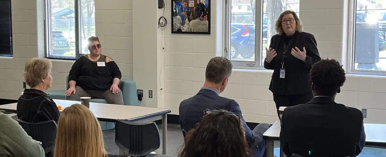 Supt Cox speaking to the group (in classroom) and other presenters 