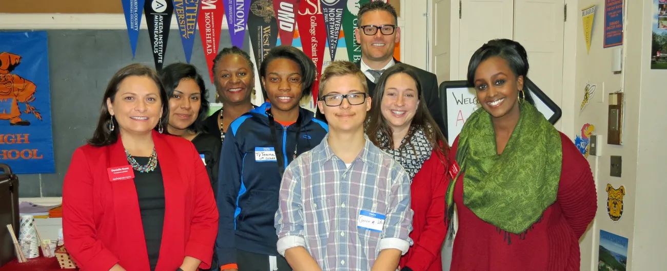 AchieveMpls staff and board with students