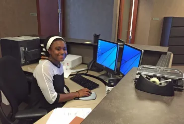 STEP-UP Intern Dejonae at her desk at Briggs & Morgan